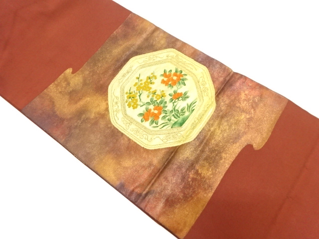 絵皿に花模様織り出し　名古屋帯